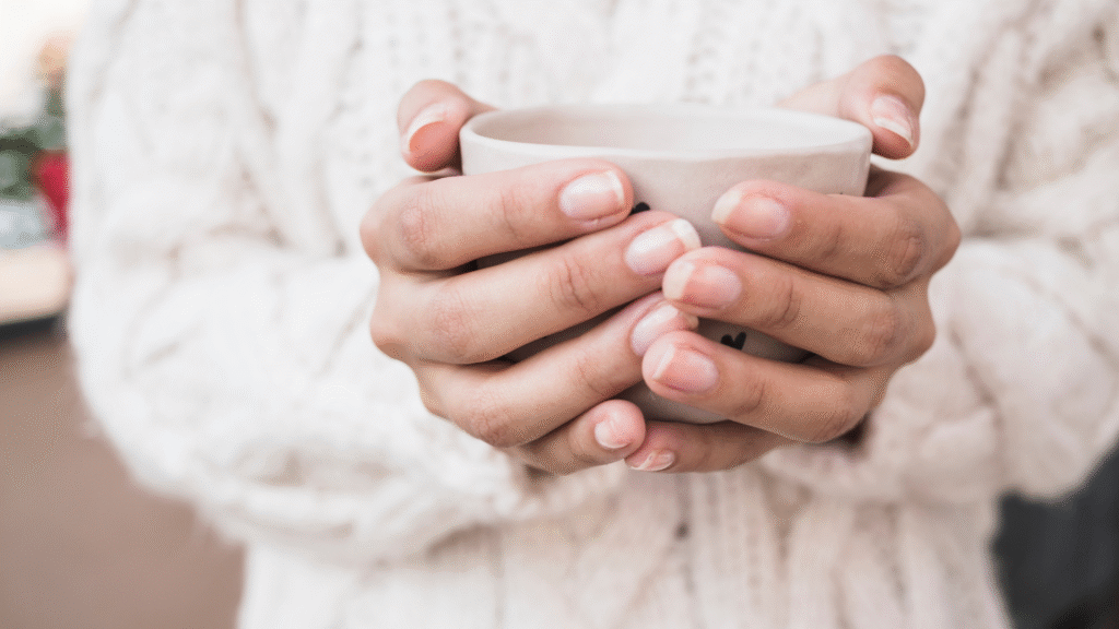 Hands Holding a Warm Mug