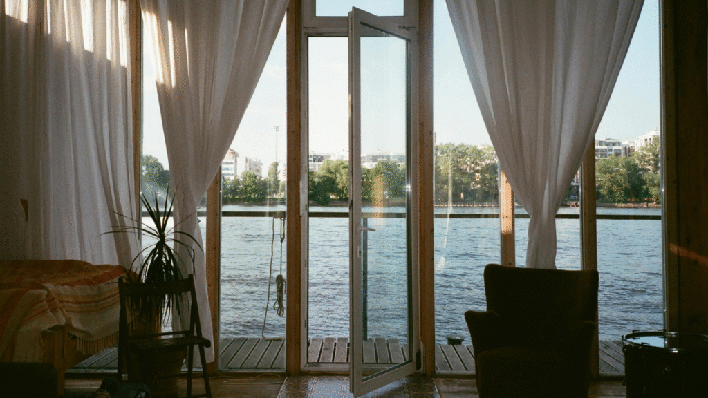 Open Window with a Breeze and Curtains