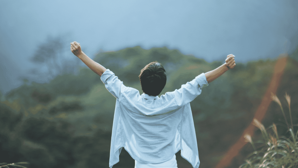 happy person open arms nature